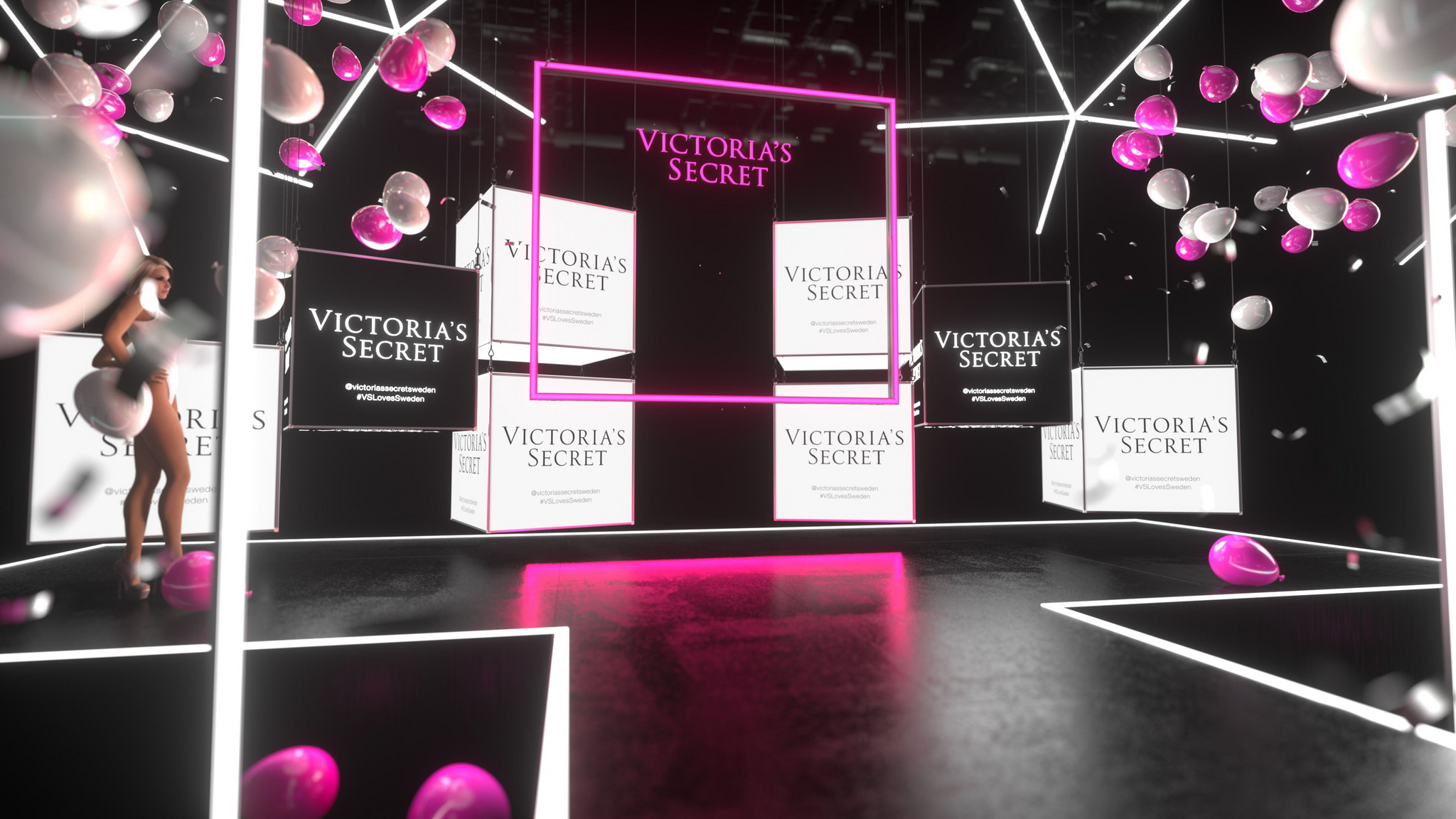 Der Victoria's Secret Event-Stand ist umgeben von pinken und weißen LED-Leuchtkonturen, die eine moderne und glamouröse Atmosphäre schaffen. Zusätzlich sind beleuchtete LED-Würfel integriert, die das Markenerlebnis verstärken. Große Displays und schwebende Luftballons in den Markenfarben ziehen die Aufmerksamkeit der Gäste auf sich und unterstreichen das exklusive Event-Setting.